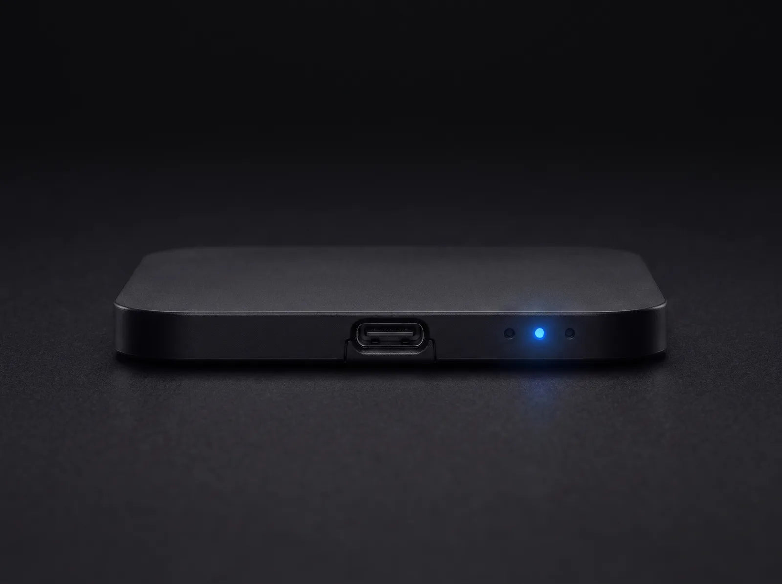 The recording indicator lit blue on Cube's bottom edge